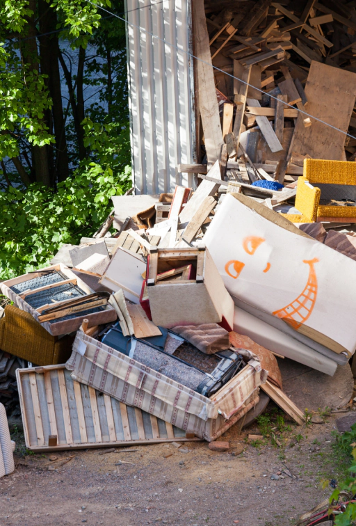trash pile outside of a house